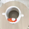 Osłonka ceramiczna na doniczkę Miś polarny z czapką