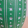 Osłonka na doniczkę ceramiczna zielona świąteczna w srebrne gwiazdki 12cm