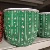 Osłonka na doniczkę ceramiczna zielona świąteczna w srebrne gwiazdki