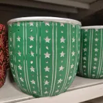 Osłonka na doniczkę ceramiczna zielona świąteczna w srebrne gwiazdki 12cm