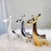 Renifer biały ceramiczny świąteczna figurka 15 cm